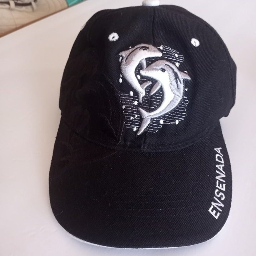 Embroidered hat with dolphins